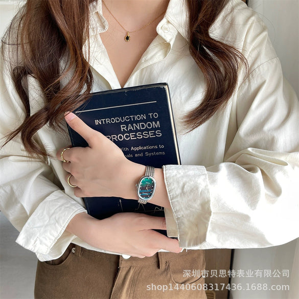 Women's Metal Case Ordinary Glass Mirror Oval Dial Retro Artistic Golden Steel Strap Watch