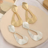 Women's Metal Geometric Water Drop Statement Earrings With Diamond Pattern And Long Dangle Design