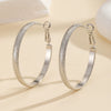 Women's Metal Hoop Earrings With Matte Finish Electroplated Surface And Bold Oversized Circular Design