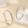 Women's Metal Hoop Earrings With Matte Finish Electroplated Surface And Bold Oversized Circular Design