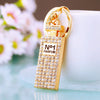 Women's Metal Perfume Bottle Car Key Chain With Diamond Encrusted Bag Pendant Key Chain Ring For Wholesale