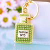 Women's Metal Perfume Bottle Car Key Chain With Diamond Encrusted Bag Pendant Key Chain Ring For Wholesale
