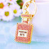 Women's Metal Perfume Bottle Car Key Chain With Diamond Encrusted Bag Pendant Key Chain Ring For Wholesale