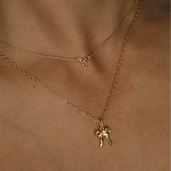 Women's Mini Bow Copper And Titanium Steel Ochain Necklace With Animal Zodiac Pattern And Electroplating Design