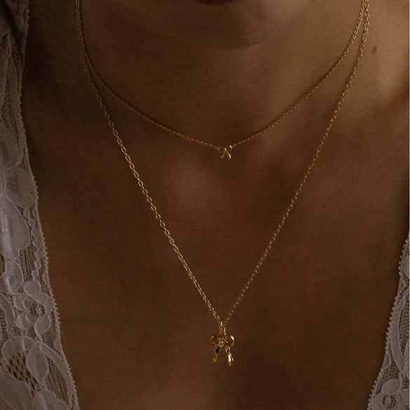 Women's Mini Bow Copper And Titanium Steel Ochain Necklace With Animal Zodiac Pattern And Electroplating Design