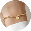Women's Minimalist Copper Bead Bracelet With Gold Electroplated Letter Charms Round Disc Pendant And Elastic Beaded String
