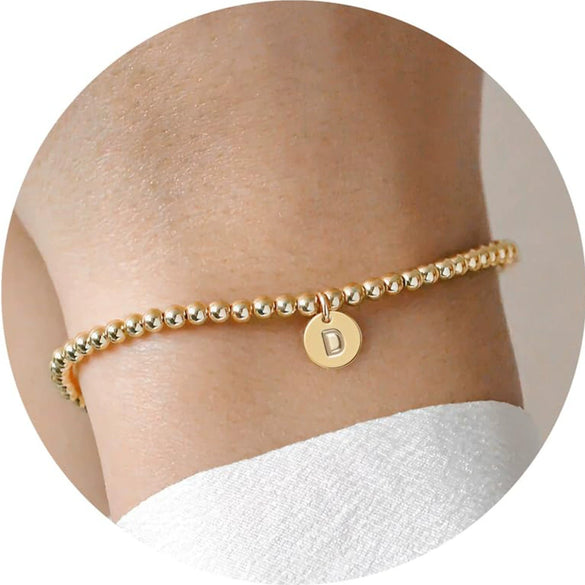 Women's Minimalist Copper Bead Bracelet With Gold Electroplated Letter Charms Round Disc Pendant And Elastic Beaded String