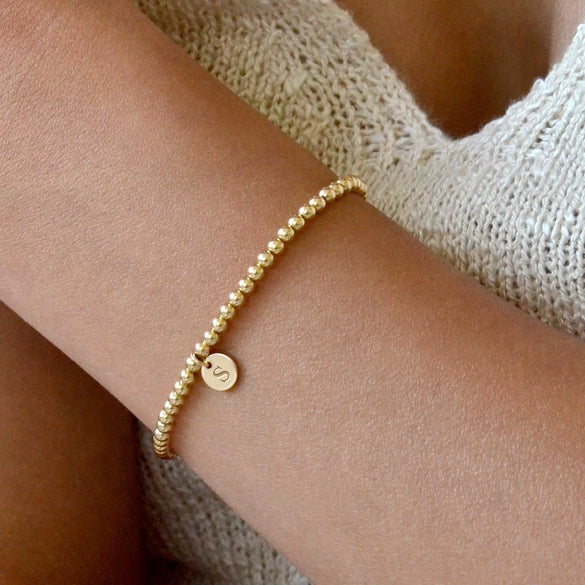 Women's Minimalist Copper Bead Bracelet With Gold Electroplated Letter Charms Round Disc Pendant And Elastic Beaded String