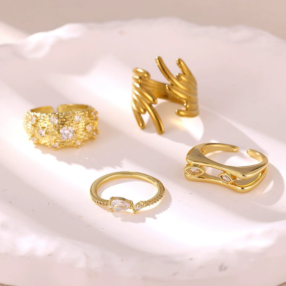 Women's Minimalist Geometric Bow Ring In Goldplated Copper With A Wideface Design And Diamondencrusted Detail