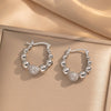 Women's Minimalist Heart Shape Titanium Steel And Copper Electroplated Round Bead Earrings