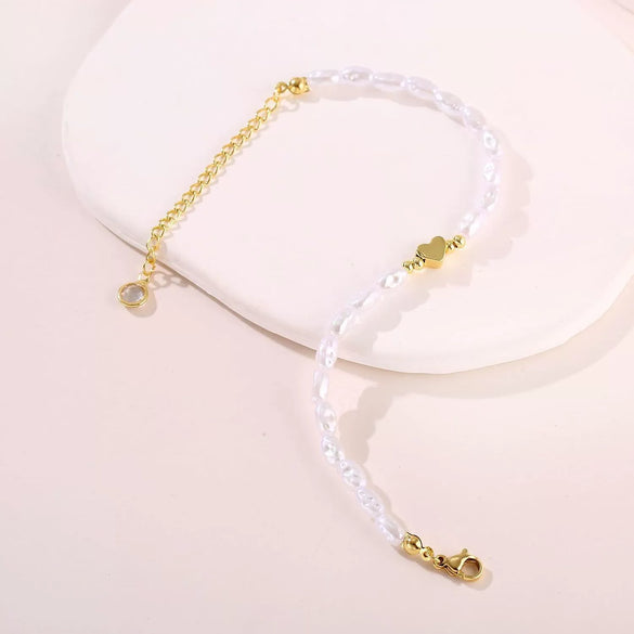 Women's Minimalist Stainless Steel Irregular Imitation Pearl Beaded Heart Bracelet With Adjustable Electroplated Design