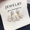 Women's Natural Freshwater Pearl Earrings With Alloy Inlaid Artificial And Semiprecious Stones And Bow Design Oblate Shape