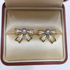 Women's Natural Freshwater Pearl Earrings With Microinlaid Zircon And Oil Bow Oblate Shape