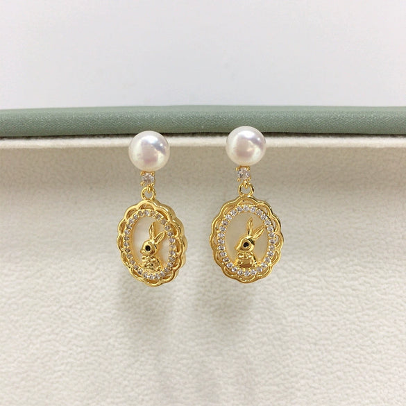 Women's Natural Freshwater Pearl Earrings With S925 Sterling Silver Needle And Sea Shell Bunny Design Oblate Shape