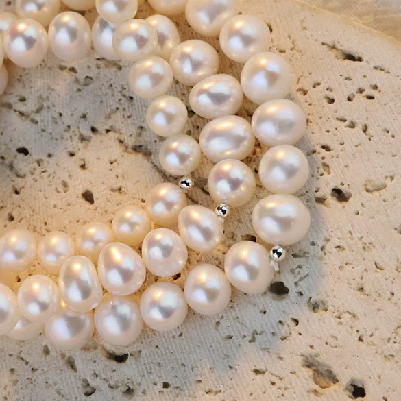 Women's Natural Freshwater Pearl Nearly Round Elastic Bracelet With Silverplated Beads And Highend Design