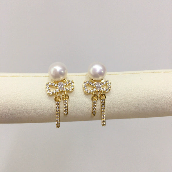 Women's Natural Freshwater Pearl S925 Sterling Silver Earrings With Microinlaid Zircon Bow Tassel And Oblate Shape