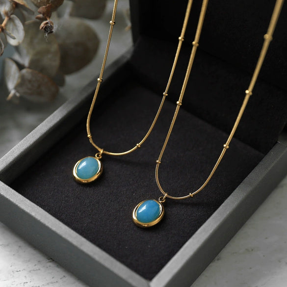 Women's Oval Aquamarine Pendant Necklace In Titanium Steel With Snake Bone Chain And Gold Plated Geometric Clavicle Chain Design