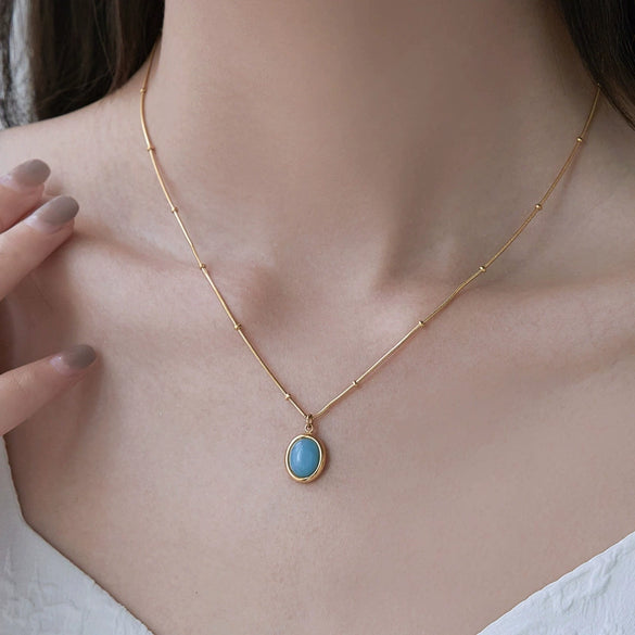 Women's Oval Aquamarine Pendant Necklace In Titanium Steel With Snake Bone Chain And Gold Plated Geometric Clavicle Chain Design
