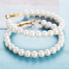 Women's Retro Artificial Pearl Earrings With Simple Letter Pattern And Creative Pendant Design