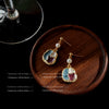 Women's Retro Geometric Metal Earrings With Color Block Irregular Shape And Dripping Oil Finish Elegant Fashion Design