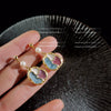 Women's Retro Geometric Metal Earrings With Color Block Irregular Shape And Dripping Oil Finish Elegant Fashion Design