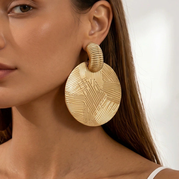 Women's Retro Geometric Round Metal Stud Earrings With Textured Embossed Gold Plating And Bold Statement Design