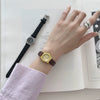 Women's Retro Leisure Metal Case Genuine Leather Strap Round Dial Quartz Watch