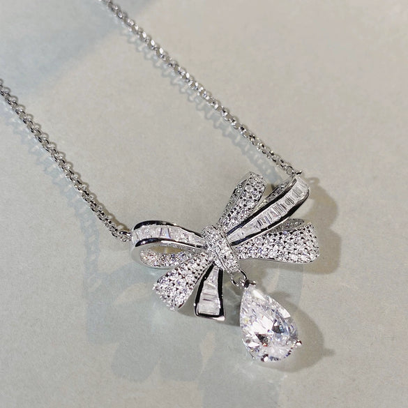 Women's 925 Silver Bow Water Drop Pendant Necklace With Full Diamond Inlay And Platinum Plating