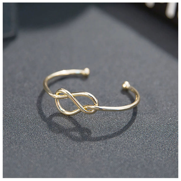 Women's Simple Geometric Knot Open Bracelet Gold Plated Copper Bangle With Figure Eight Shape Business Style