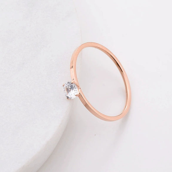 Women's Simple Geometric Stainless Steel Single Stone Ring With Four Claw Setting And Rose Gold Electroplated Finish