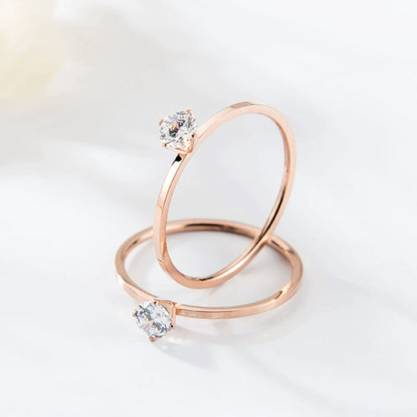Women's Simple Geometric Stainless Steel Single Stone Ring With Four Claw Setting And Rose Gold Electroplated Finish