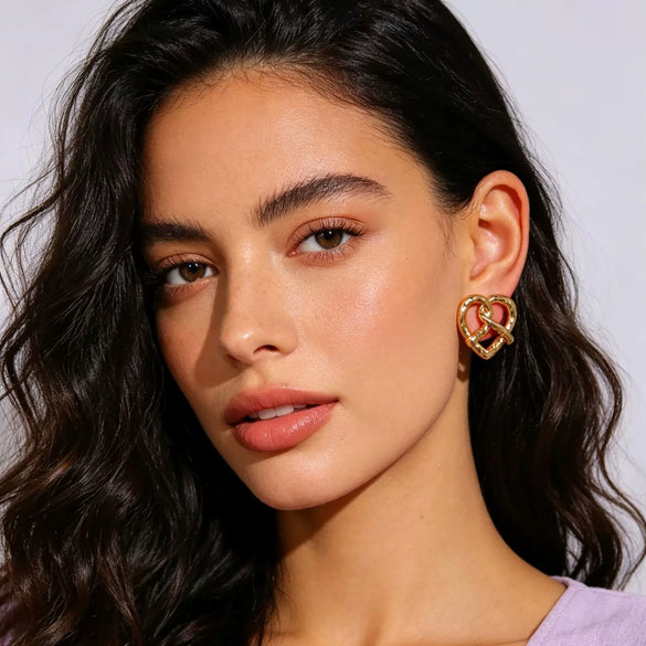 Women's Simple Heart Shaped Knot Earrings In Electroplated Alloy With Steel Ear Needles Fashion Bread Knot Design