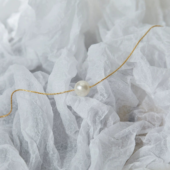 Women's Simple Natural Pearl Smile Necklace With Titanium Steel Snake Bone Chain And Electroplated Gold Color Finish