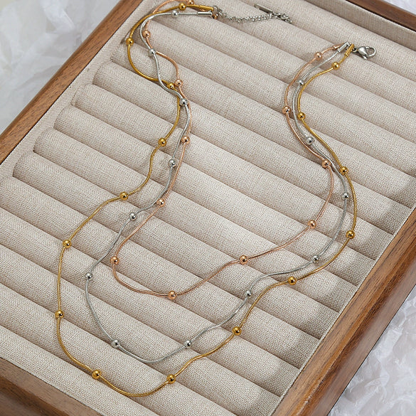 Women's Stainless Steel And Titanium Steel Multilayer Stitching Contrast Color Round Bead Necklace With U Shape Pattern And Electroplating Treatment