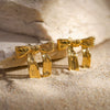 Women's Stainless Steel Bow Pattern Electroplated Titanium Steel Earrings With Golden Hammer Pattern Fashionable And Simple