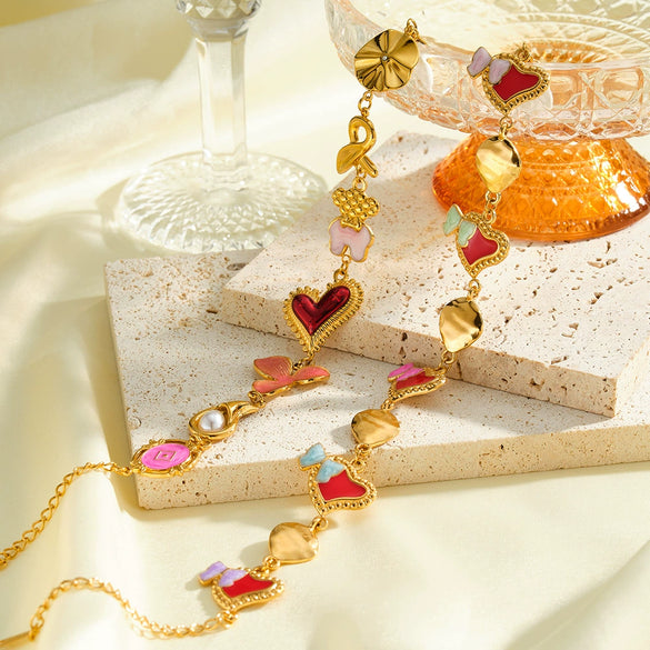 Women's Stainless Steel Bracelet With Heart And Bow Design Pearl And Rhinestone Inlay Oil Drip Finish And Gold Tone Vacuum Plating