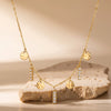 Women's Stainless Steel Geometric Disc Pendant Necklace With Rhinestone Tassel Detail And Electroplated Finish