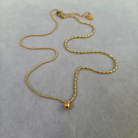 Women's Stainless Steel Geometric Round Bead Gold Bean Necklace With Electroplated Design And Rice Grain Wave Bead Chain