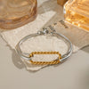 Women's Stainless Steel Geometric Twist Bracelet With Electroplating Gold And Silver Color Matching