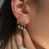 Women's Stainless Steel Geometric Wave Hoop Earrings With Sparkling Zirconia And Plated Finish