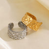 Women's Stainless Steel Geometric Wide Face Hammer Pattern Open Ring With Real Gold Plating And Flower Design