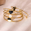 Women's Stainless Steel Goldplated Bracelet With Flower Butterfly And Heart Motifs Modern Minimalist Botanical Jewelry