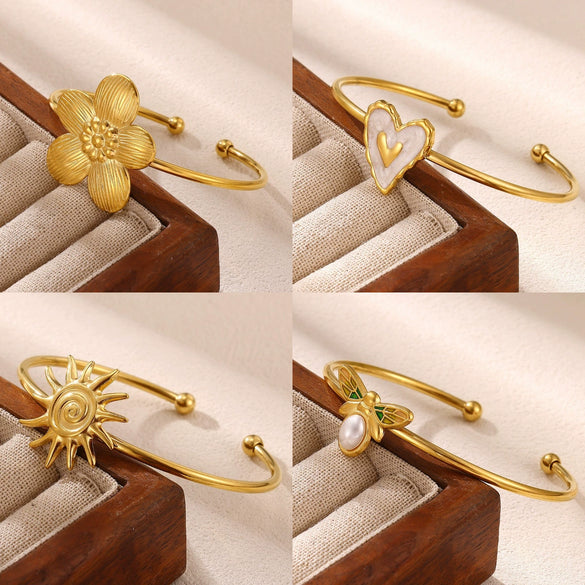 Women's Stainless Steel Goldplated Cshaped Open Bangle With Flower Heart Sun Bee And Pearl Details