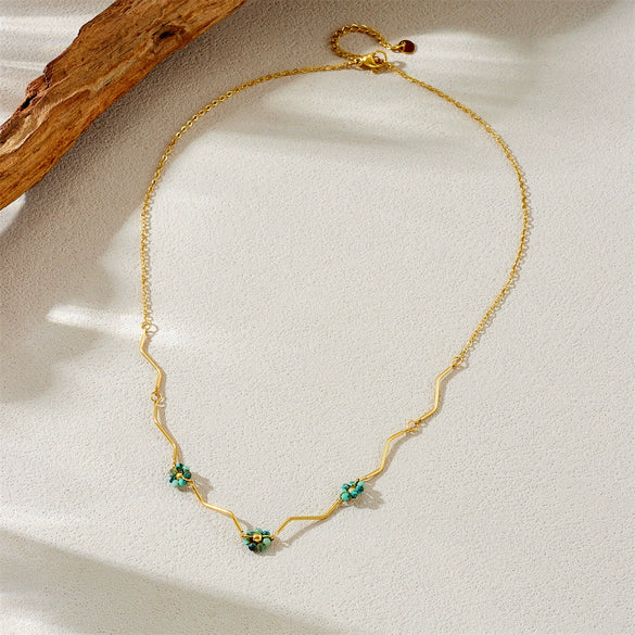 Women's Stainless Steel Goldplated Necklace With Irregular Twisted Flower Beaded Design And Electroplating Process