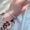 Women's Sterling Silver Heart Shaped Love Bracelet With Geometric Design And Single Row Sparkling Stone Chain Electroplated Finish