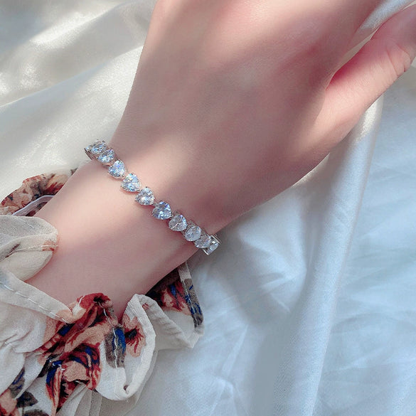 Women's Sterling Silver Heart Shaped Love Bracelet With Geometric Design And Single Row Sparkling Stone Chain Electroplated Finish