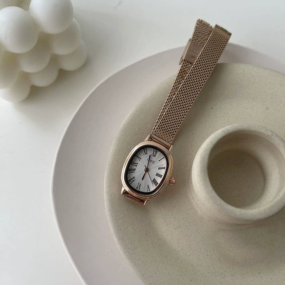 Women's Summer French Retro Alloy Case Ordinary Glass Mirror Oval Thin Band Compact Roman Golden Watch