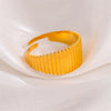 Women's Titanium Steel And Stainless Steel Geometric Vertical Strip Bread Dome Ring With 18K Gold Plated Electroplating