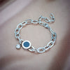 Women's Titanium Steel Bracelet With Black Round Roman Numeral Round Plate Rhinestone Pendant And Electroplating Treatment