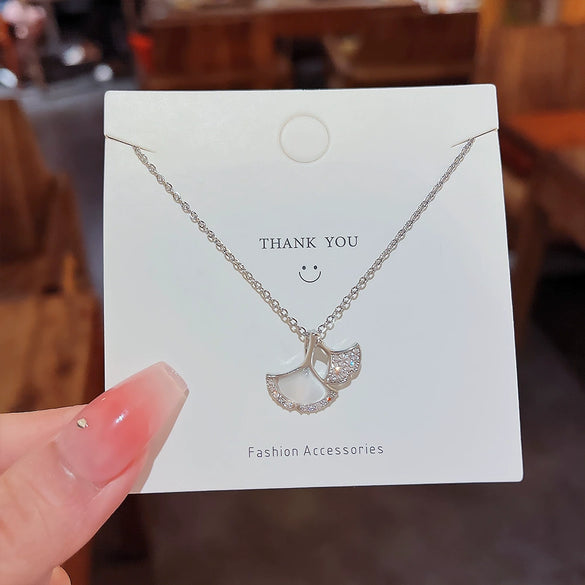 Women's Titanium Steel Copper Microinlaid Zircon Ginkgo Leaf Pendant Necklace With Diamond Design